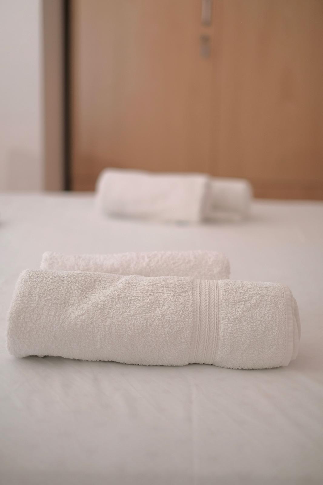 Fresh towels prepared for guests of the seaside apartment in Vinišće